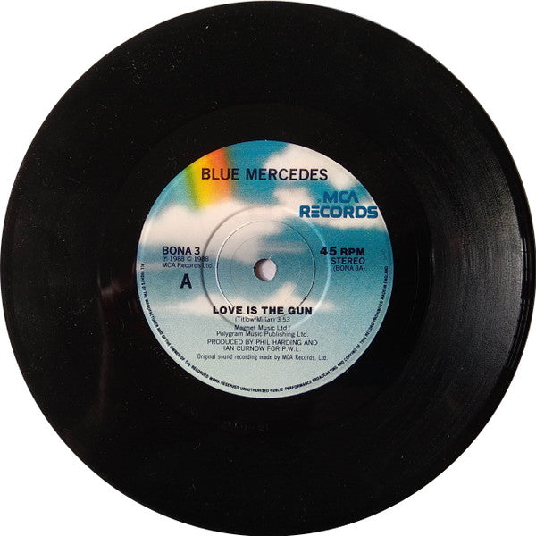 Blue Mercedes : Love Is The Gun (7", Single, Blu)