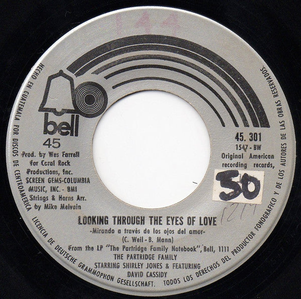 The Partridge Family Starring Shirley Jones (2) & Featuring David Cassidy : Looking Through The Eyes Of Love = Mirando A Través De Los Ojos Del Amor (7", Single)