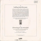 Simply Red - Holding Back The Years (7) (Very Good Plus (VG)) - DaddyPop