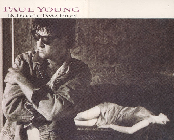 Paul Young : Between Two Fires (Cass, Album, Dol)