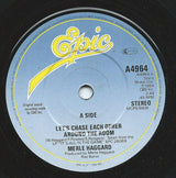 Merle Haggard : Let's Chase Each Other Around The Room / You Nearly Lose Your Mind (7", Single)