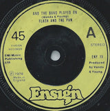 Flash & The Pan : And The Band Played On (7", Single, Gre)