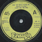 Flash & The Pan : And The Band Played On (7", Single, Gre)