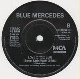 Blue Mercedes : Love Is The Gun (7", Single, Bla)